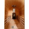 Vue intérieure d'un sauna baril en bois avec un poêle à bois et un coin salon ouvert – BUCI